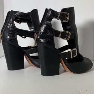 Schutz black cut out booties